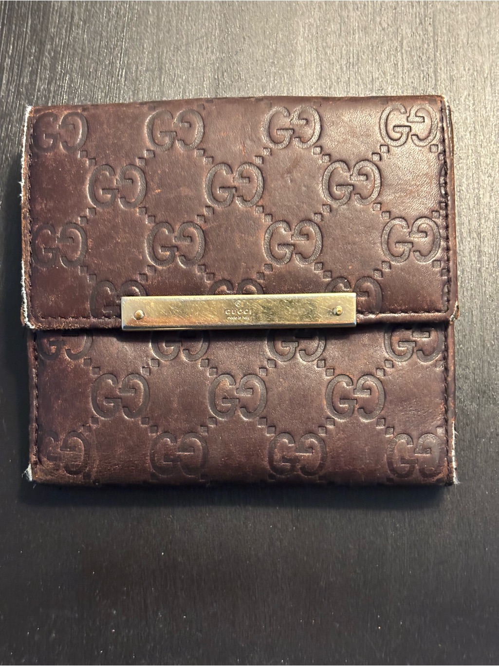 Vintage Gucci Brown Embossed Gg Leather Wallet With Gold Tone Bar